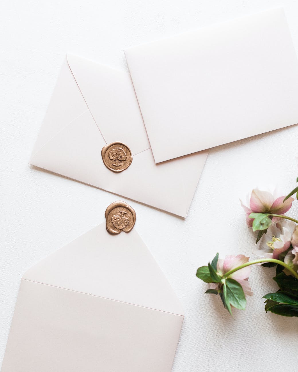 white envelopes scattered on table